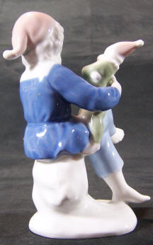 8158-males-boy-with-clown-doll back view